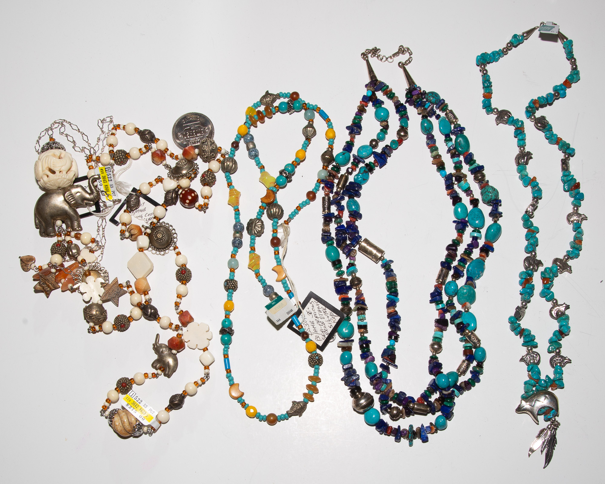 A COLLECTION OF BEADED NECKLACES various