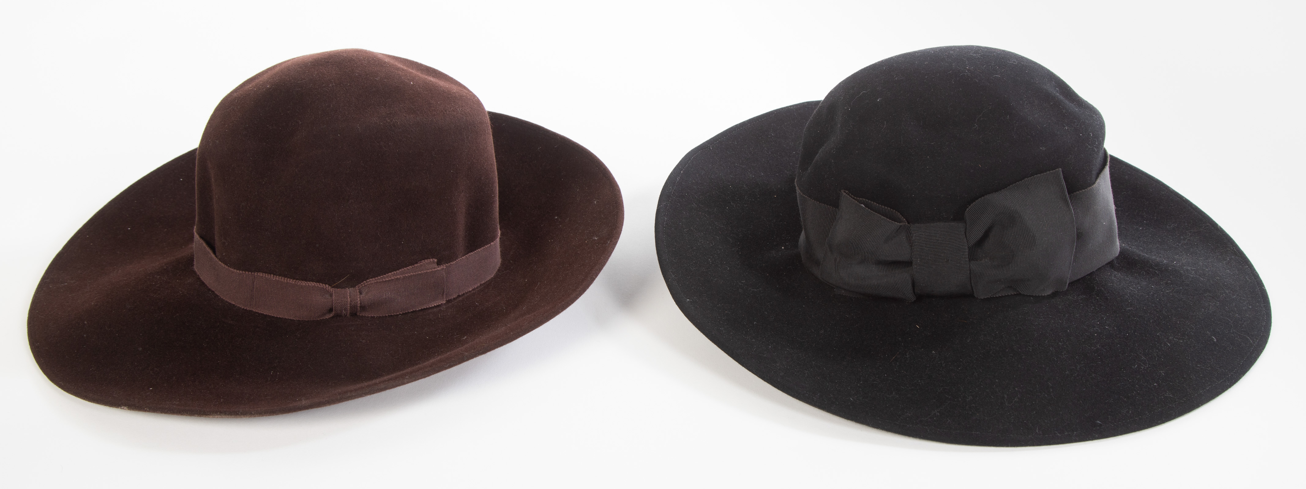 TWO FELT BRIMMED HATS WITH BOWS