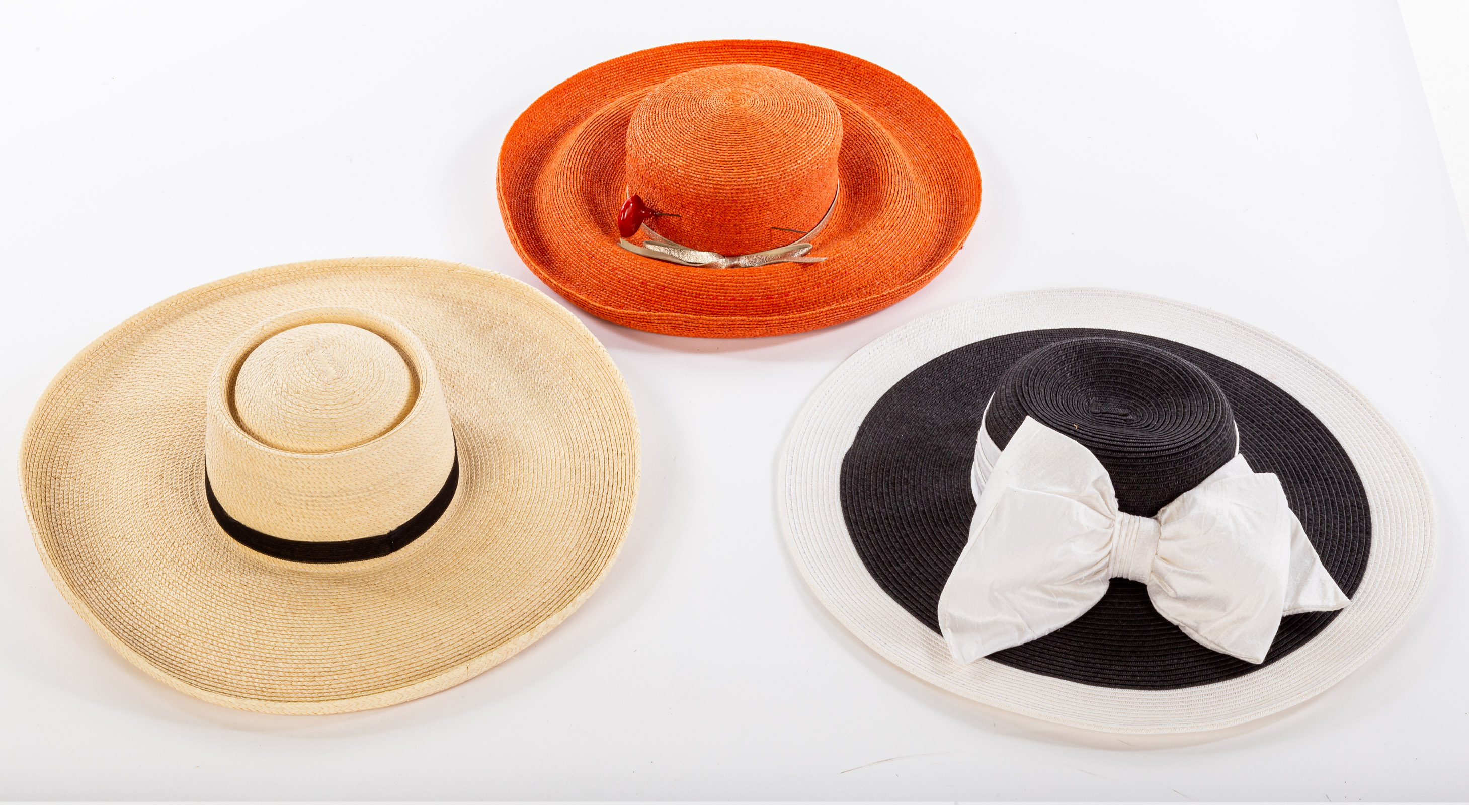 THREE WOVEN STRAW SUN HATS One black