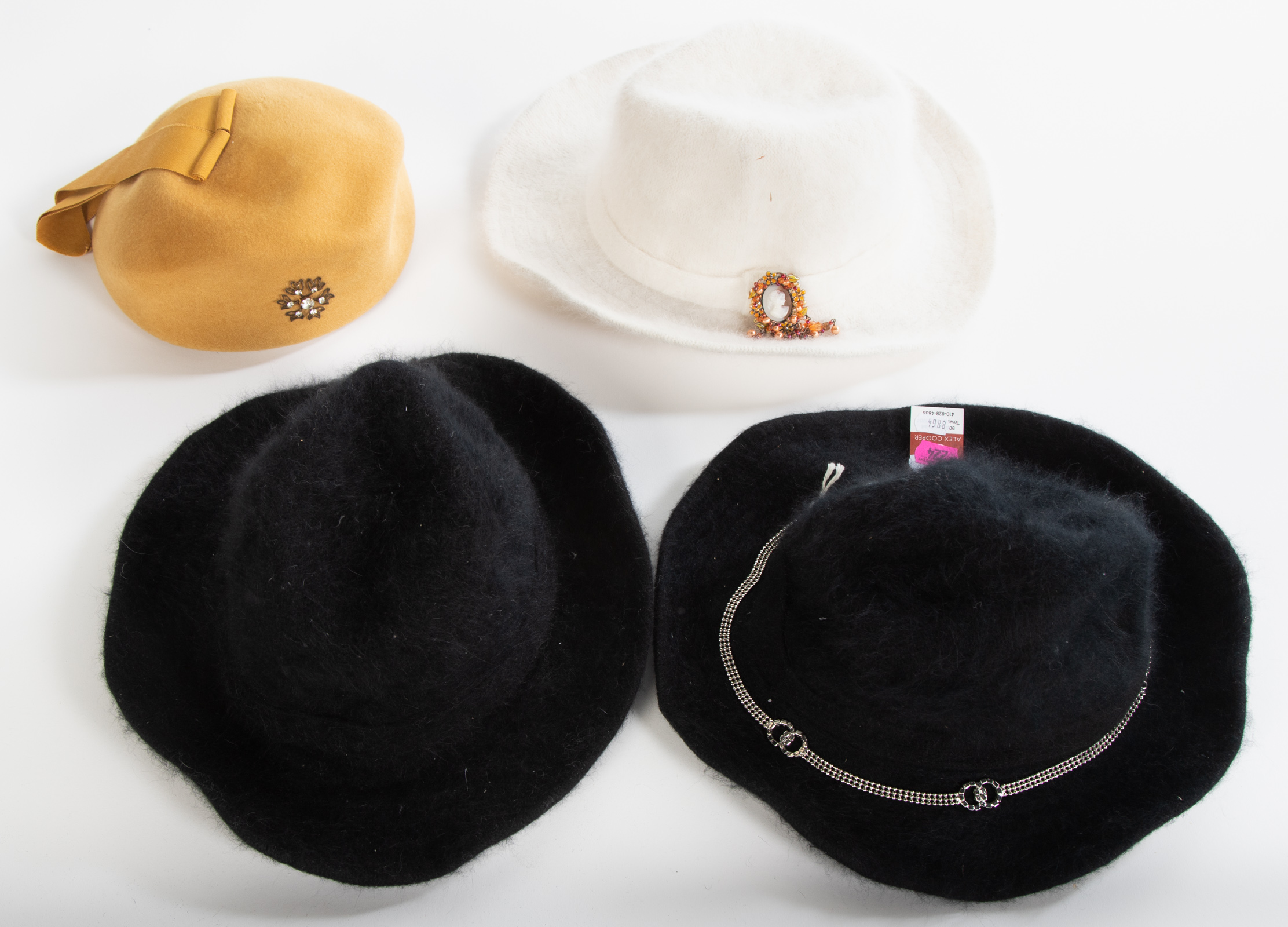 FOUR MISCELLANEOUS HATS One yellow