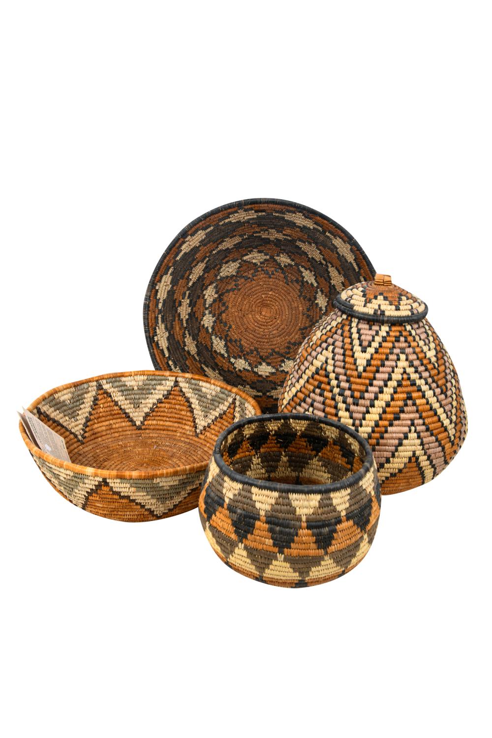 SET OF FOUR WOVEN STRAW ZULU BASKETSwith