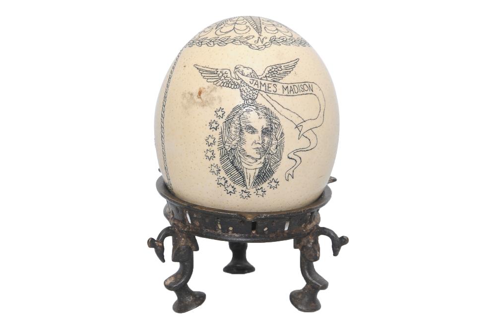 SCRIMSHAW OSTRICH EGG ON STANDdepicting