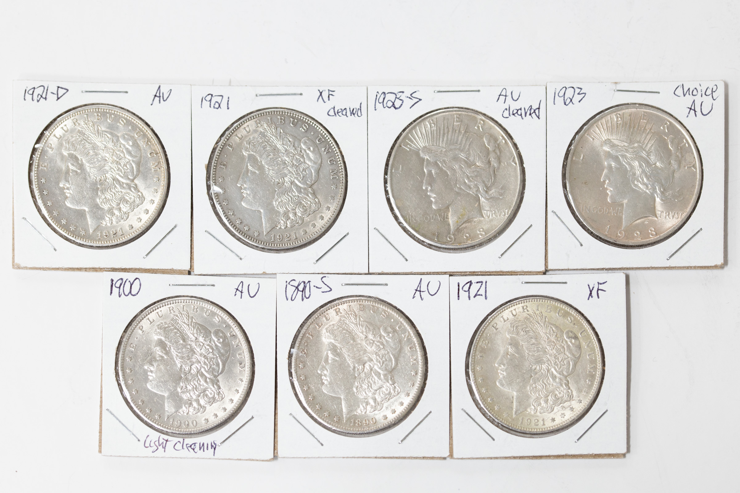 SEVEN US SILVER DOLLARS 1890-S