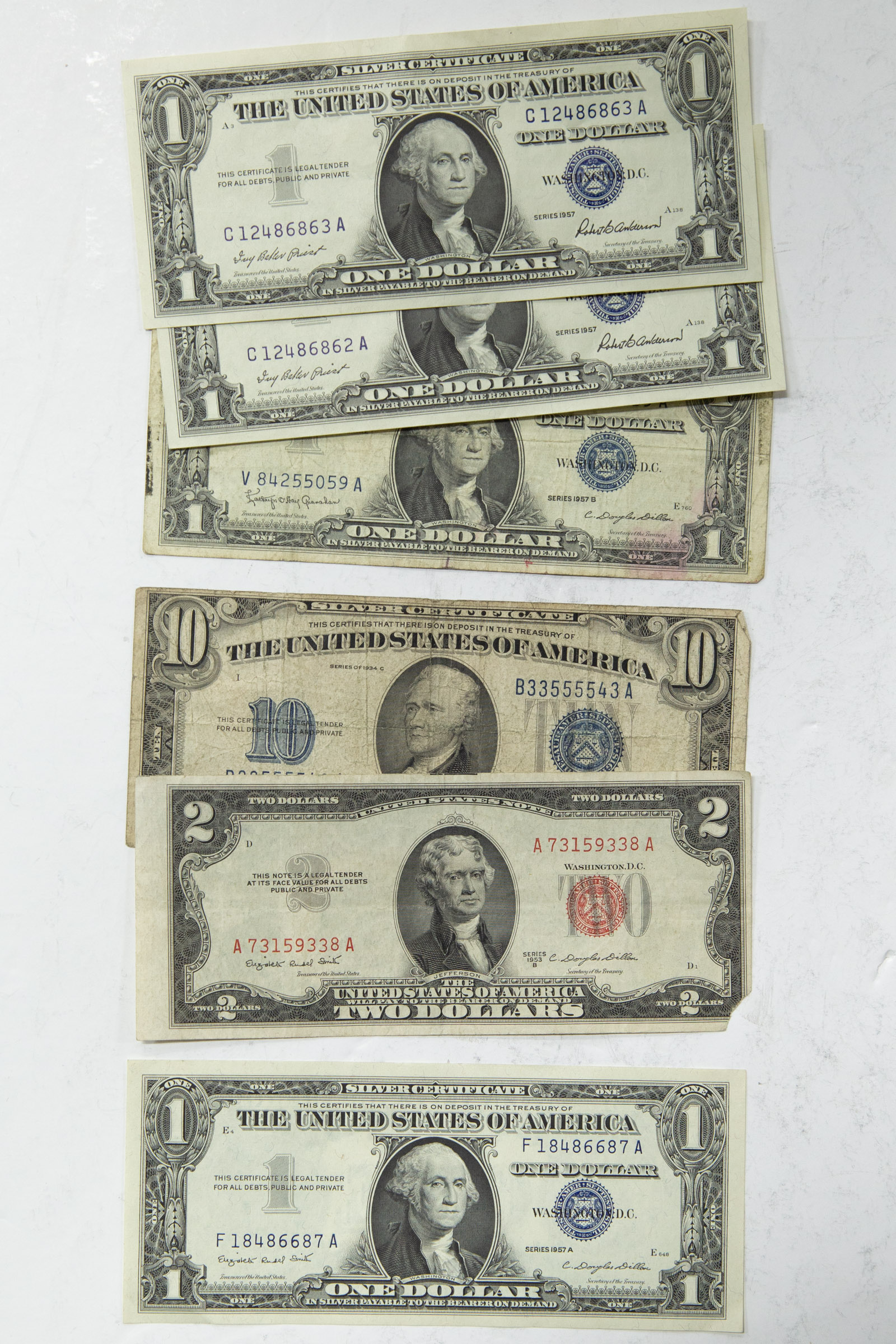 FOUR $1 SILVER CERTIFICATES & ONE