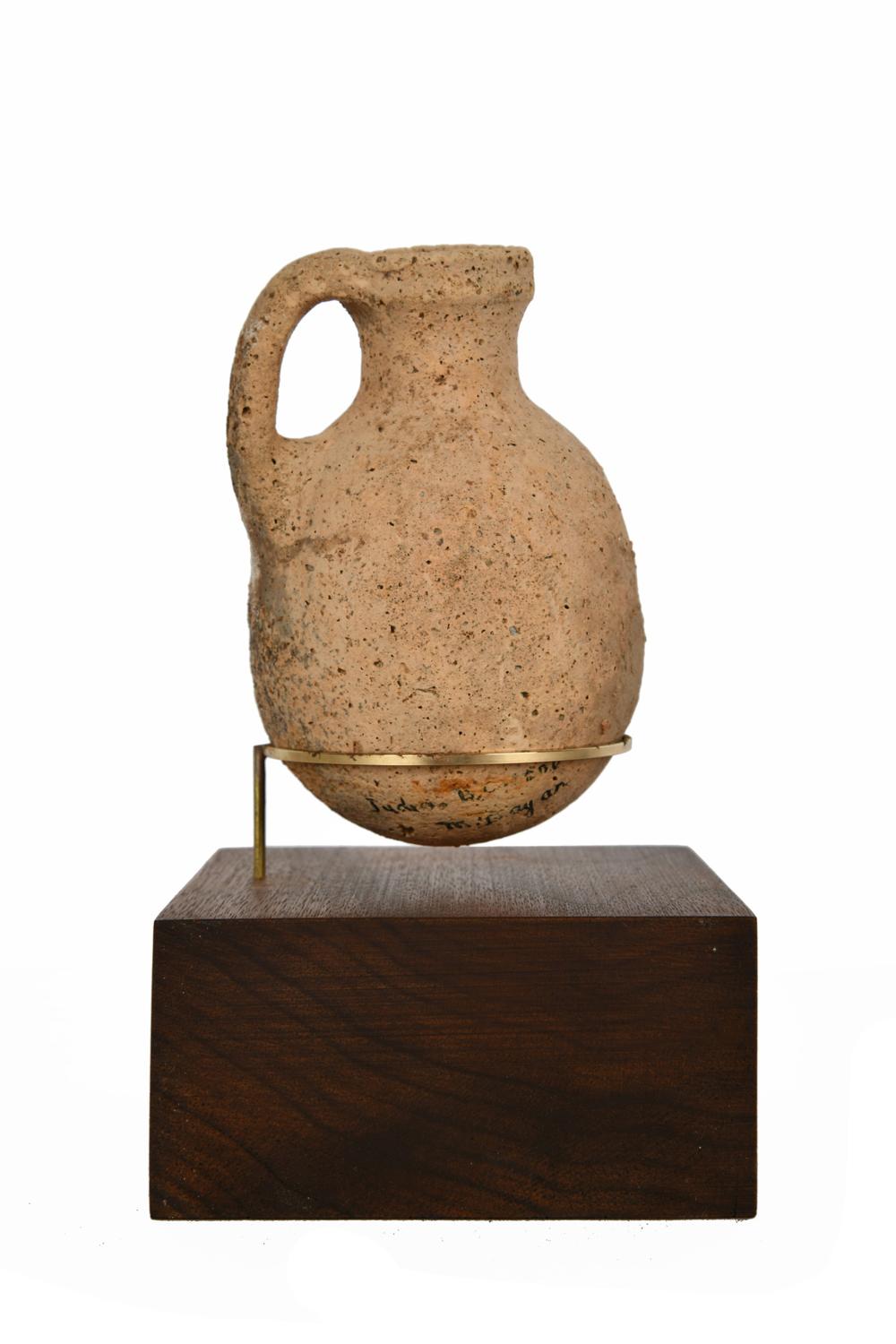 ARCHAIC STYLE POTTERY JUGpossibly Bronze