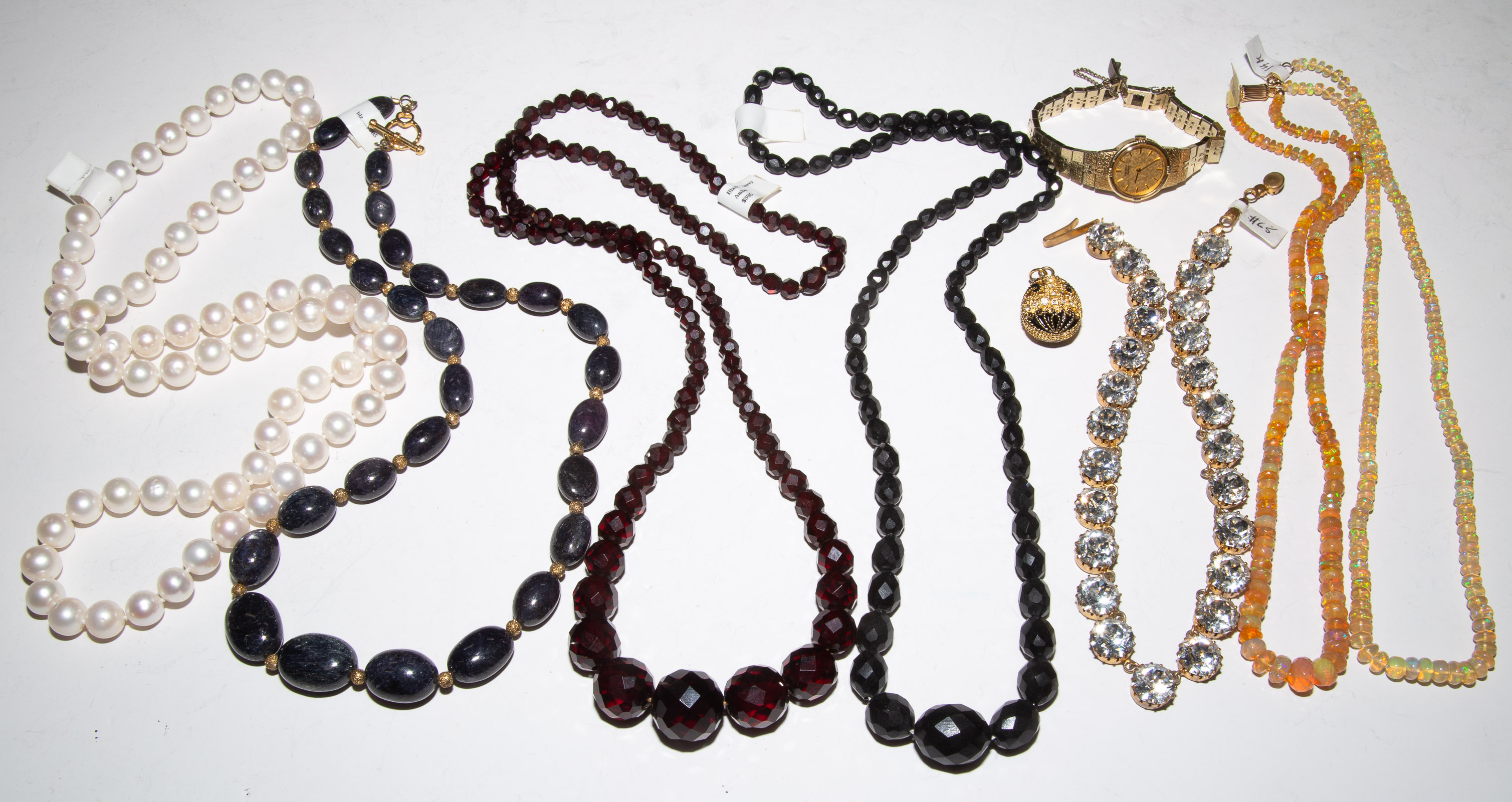 AN ASSORTMENT OF BEADED NECKLACES