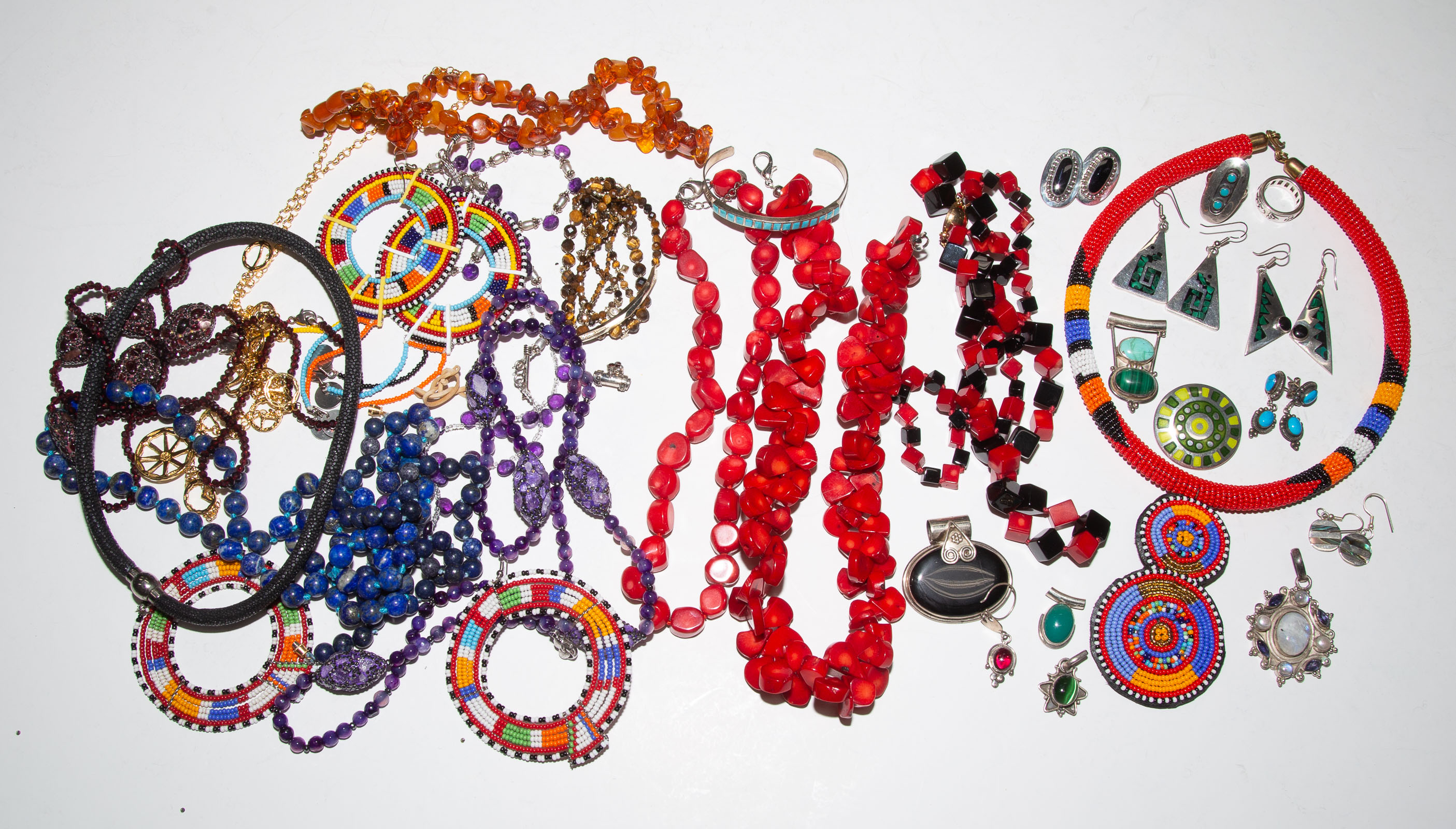 A COLLECTION OF BEADED NECKLACES & MORE