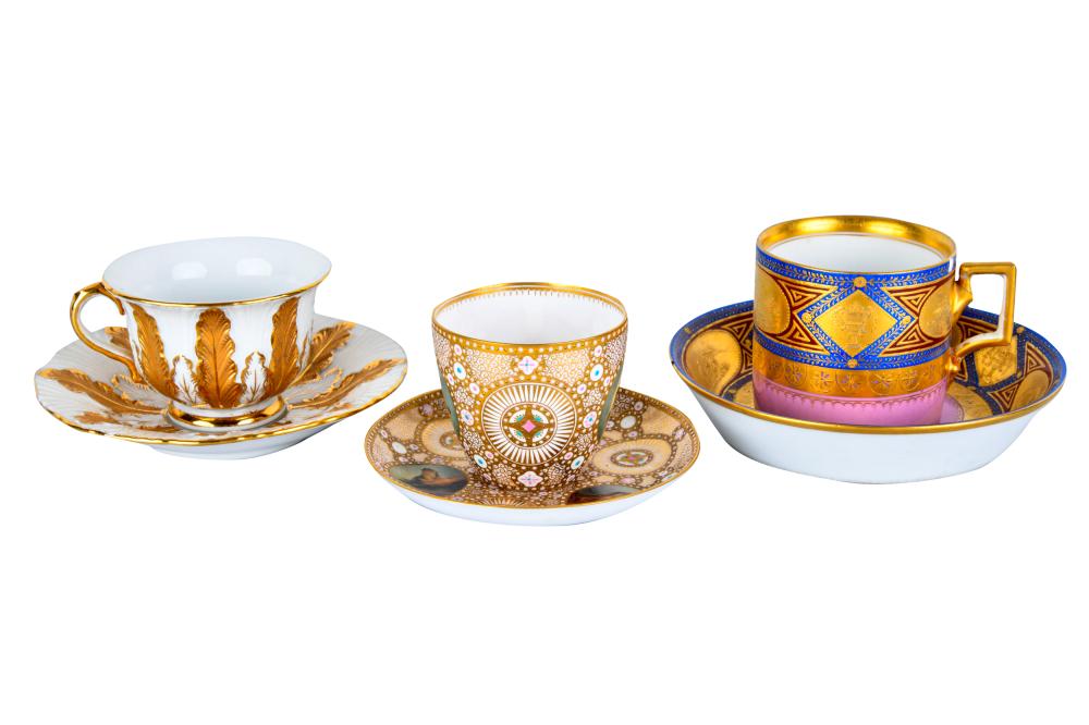 THREE PORCELAIN DEMITASSE CUPS WITH