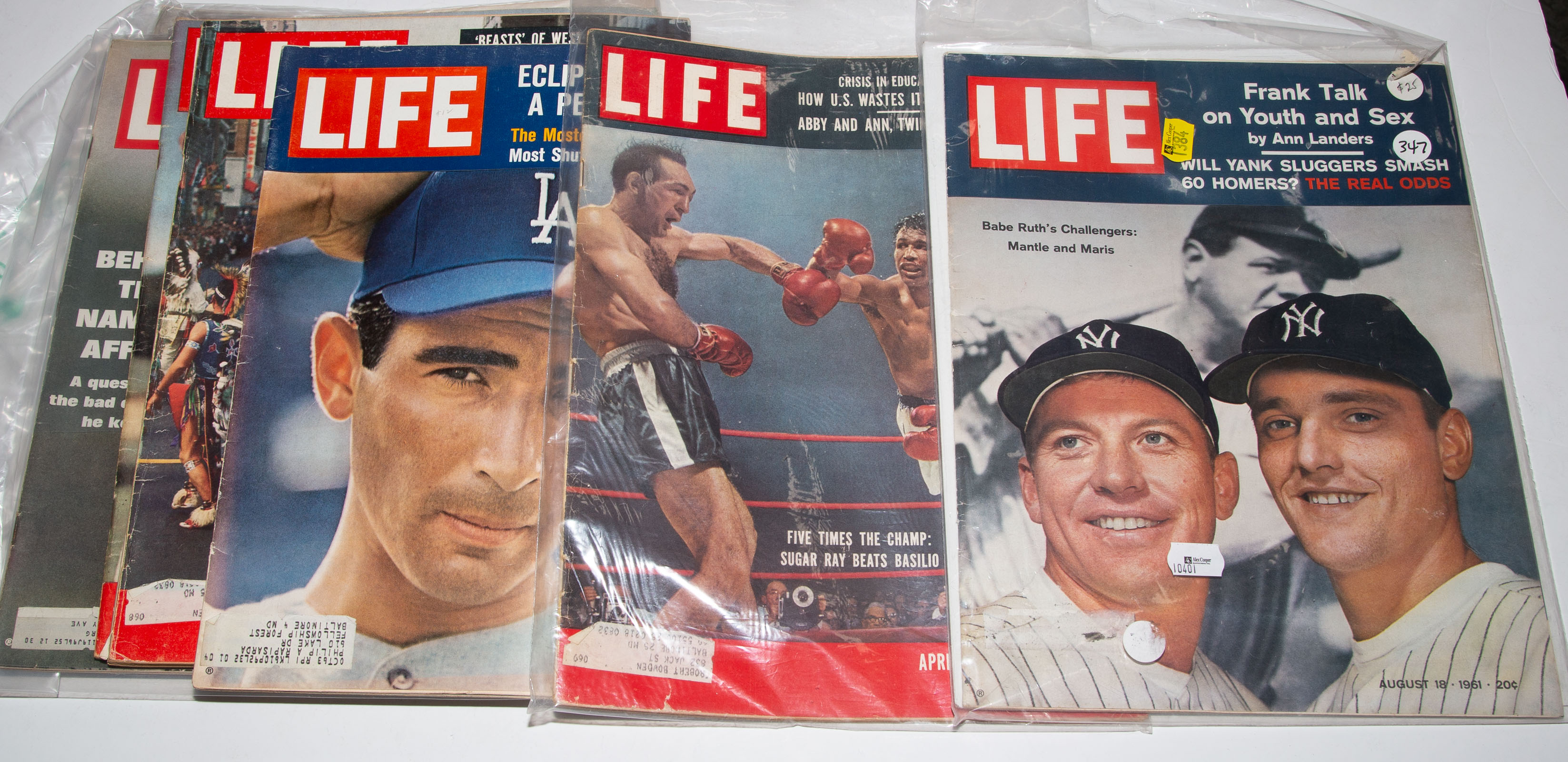 GROUP OF VINTAGE SPORT RELATED LIFE