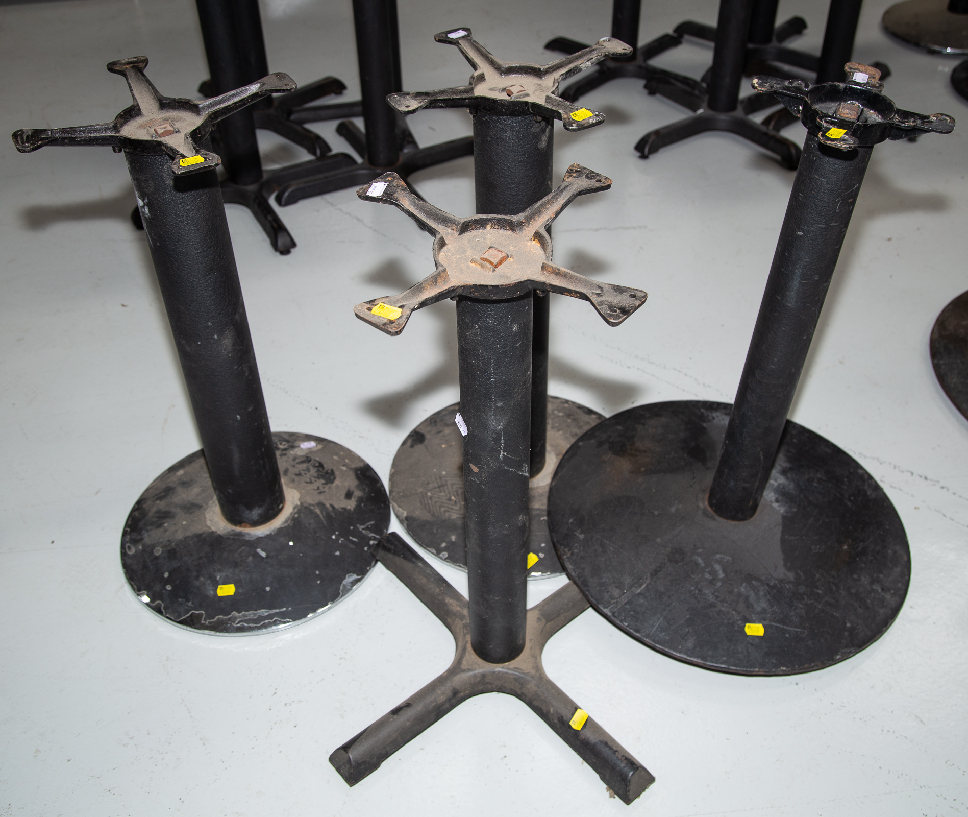 FOUR ASSORTED METAL TABLE BASES