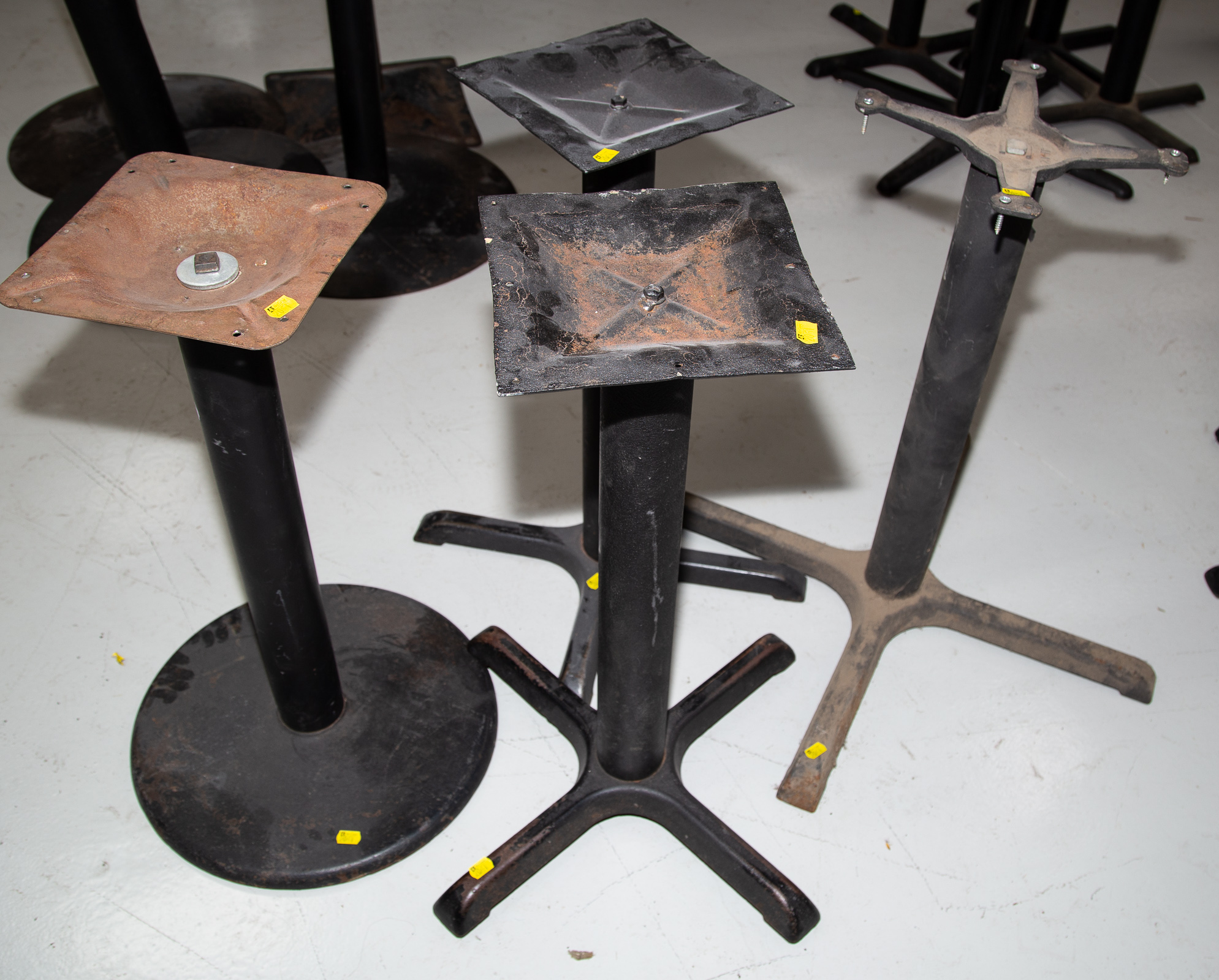 FOUR ASSORTED METAL TABLE BASES 27 1/2