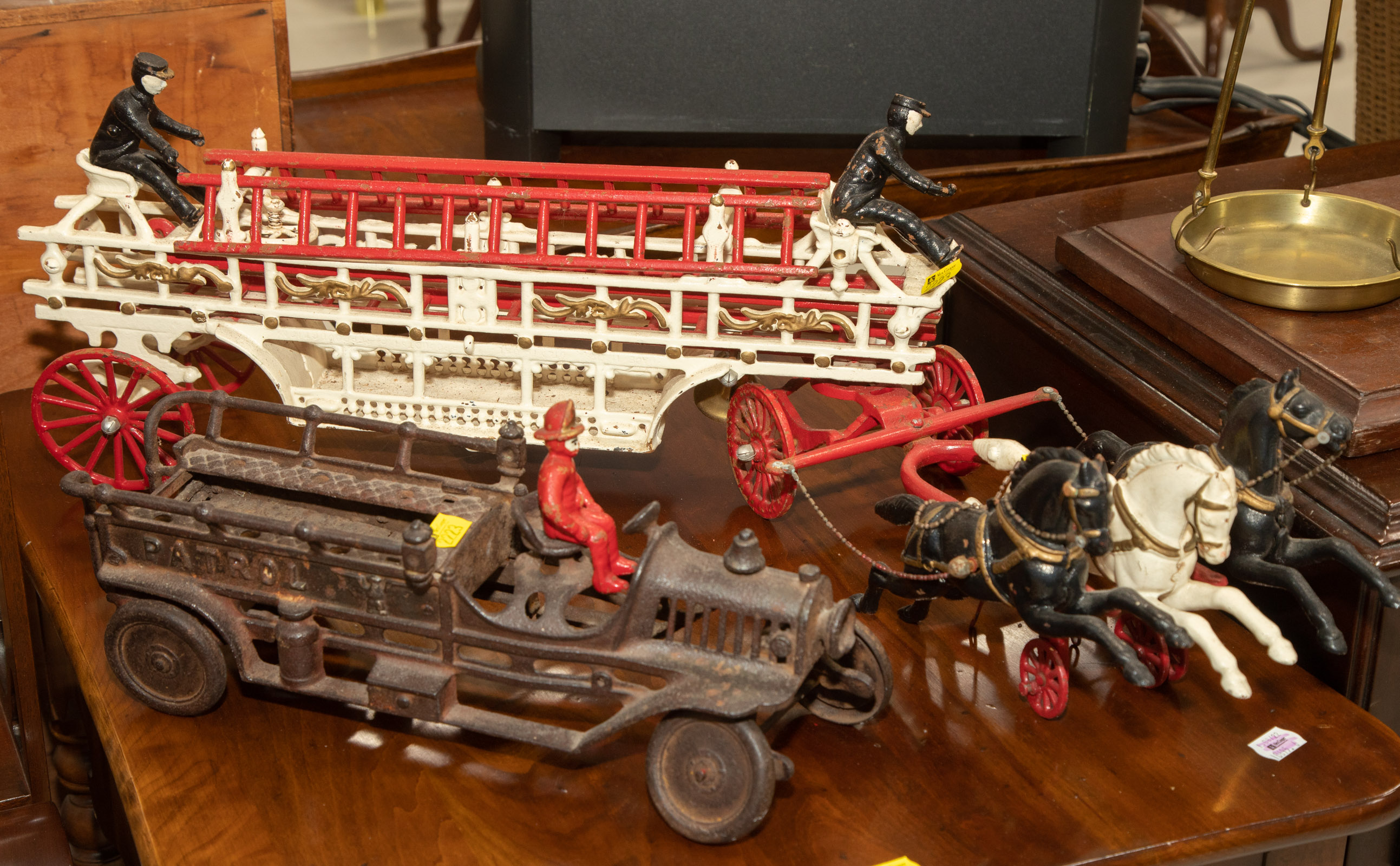 TWO CAST IRON FIRE TRUCKS Includes