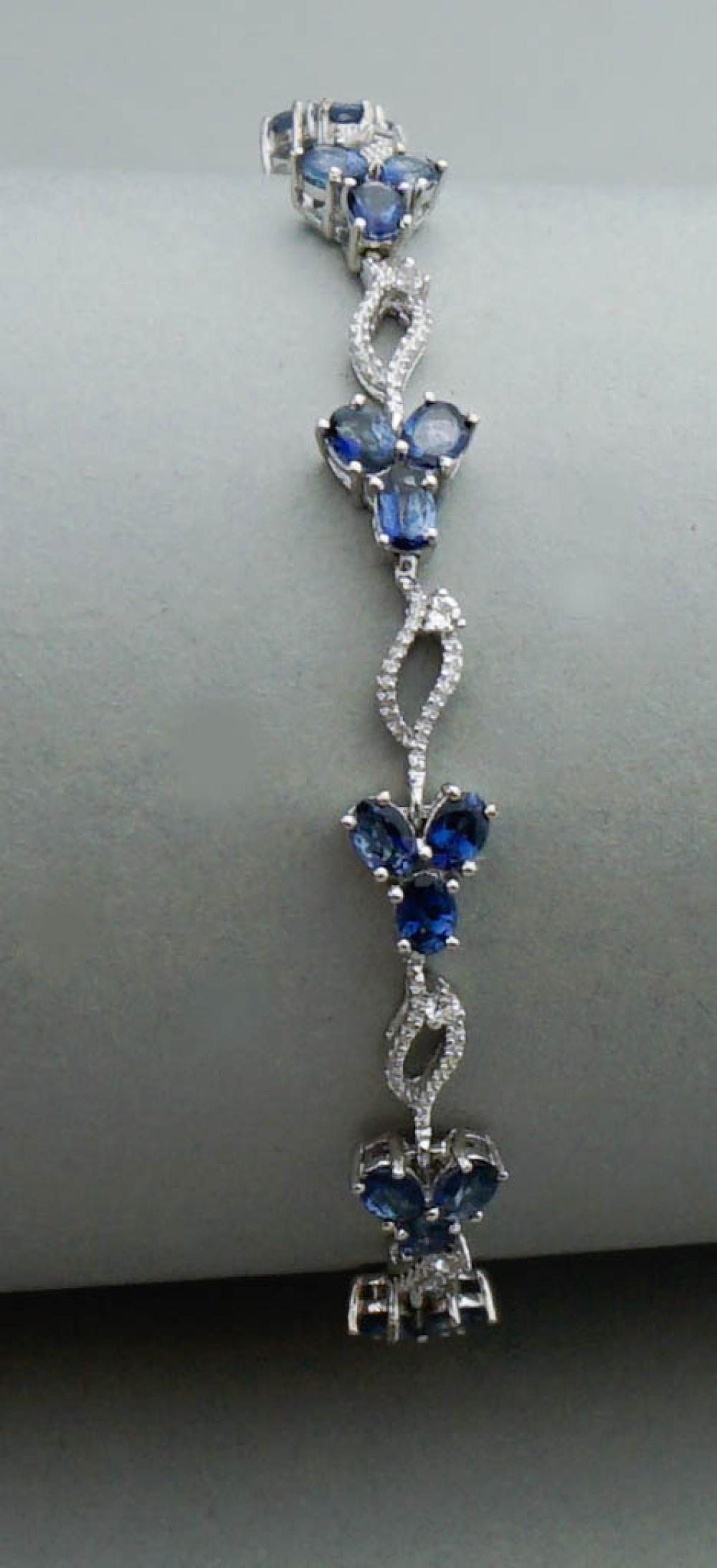 TANZANITE, WHITE TOPAZ AND SILVER