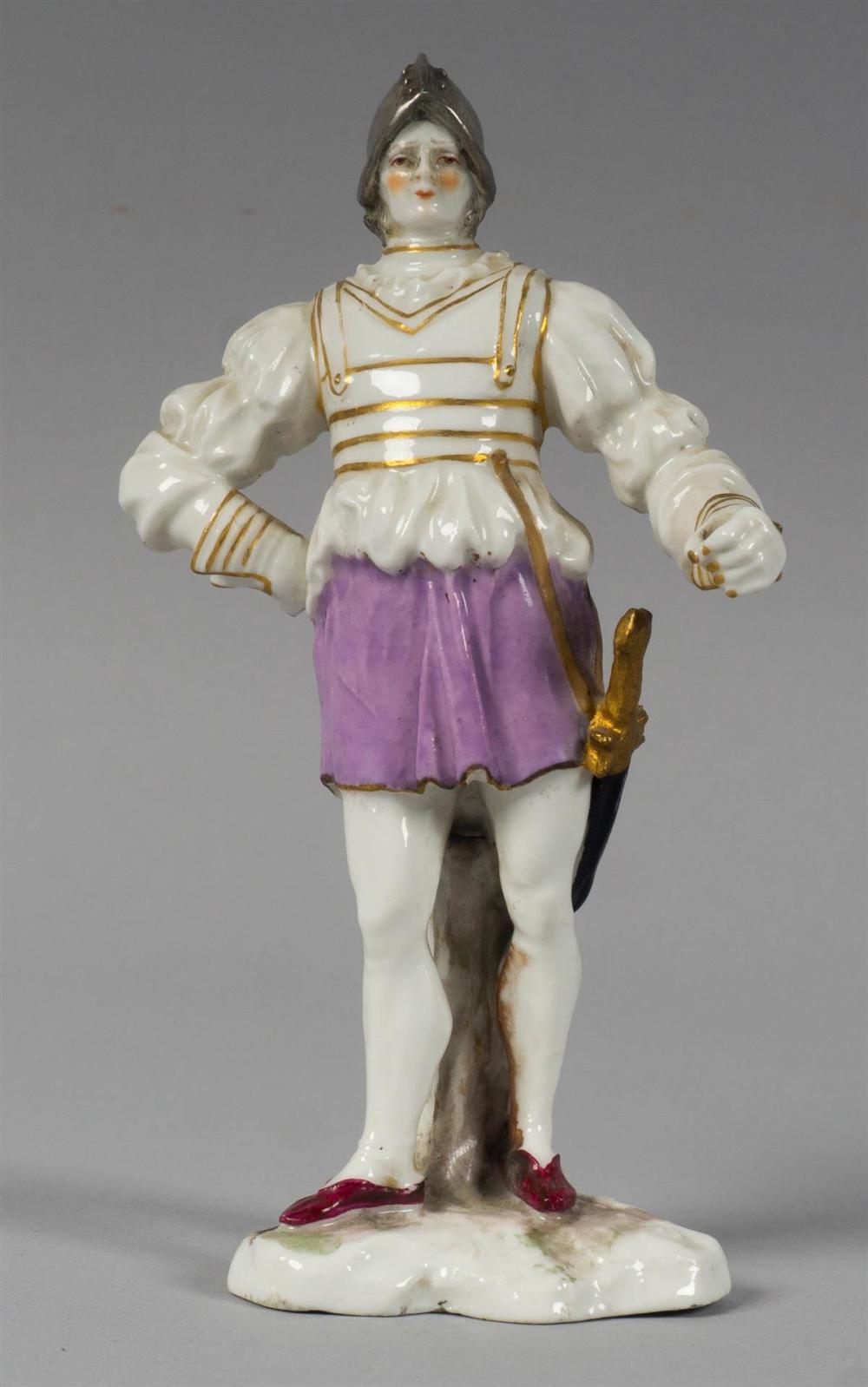 CONTINENTAL PORCELAIN FIGURE OF A MEDIEVAL