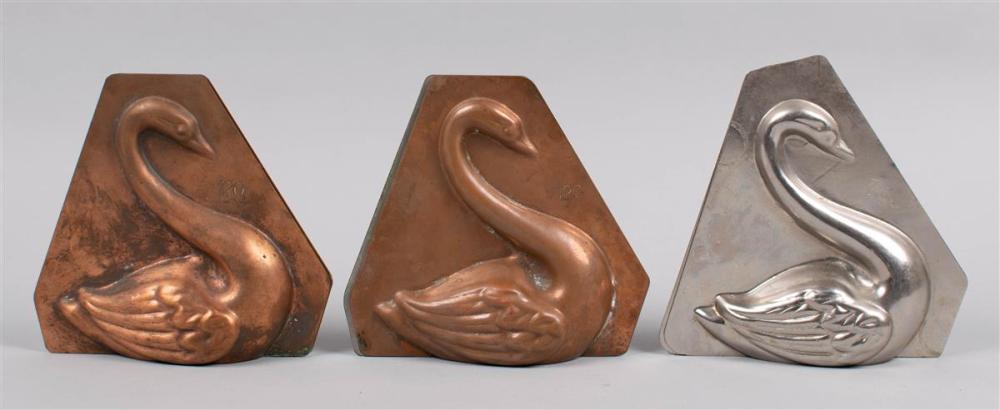 THREE COPPER AND TIN SWAN MOLDS,