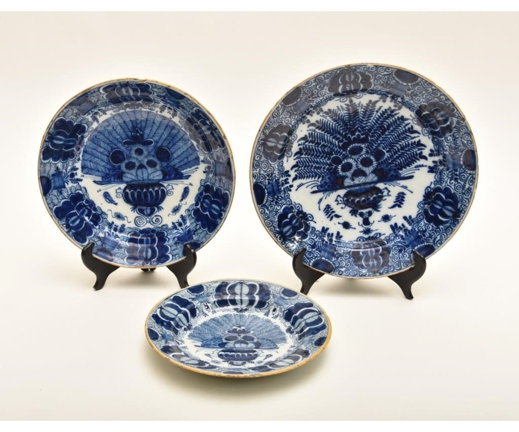 Three deep Delft plates, 18th c. 
Largest