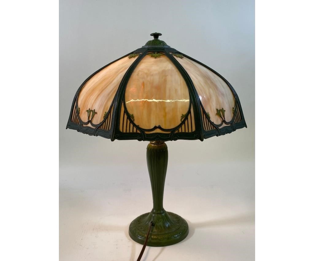 Slag glass table lamp with green metal