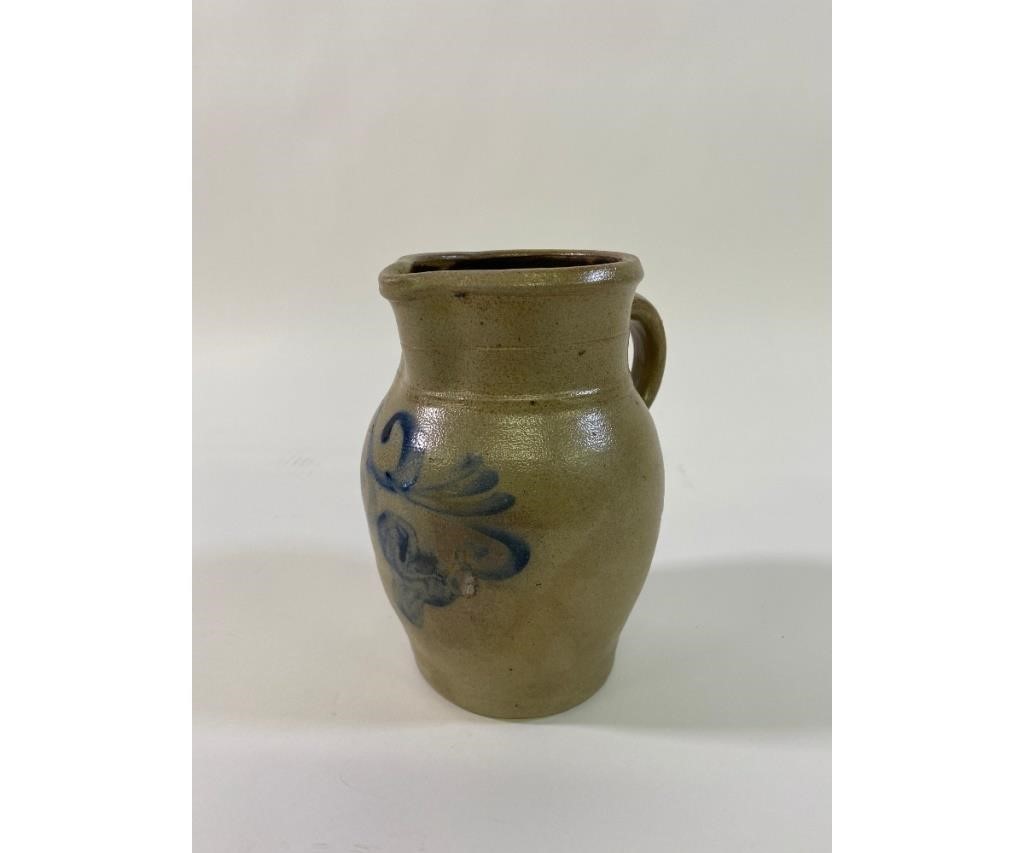 Small stoneware pitcher with blue decoration.
7.25h