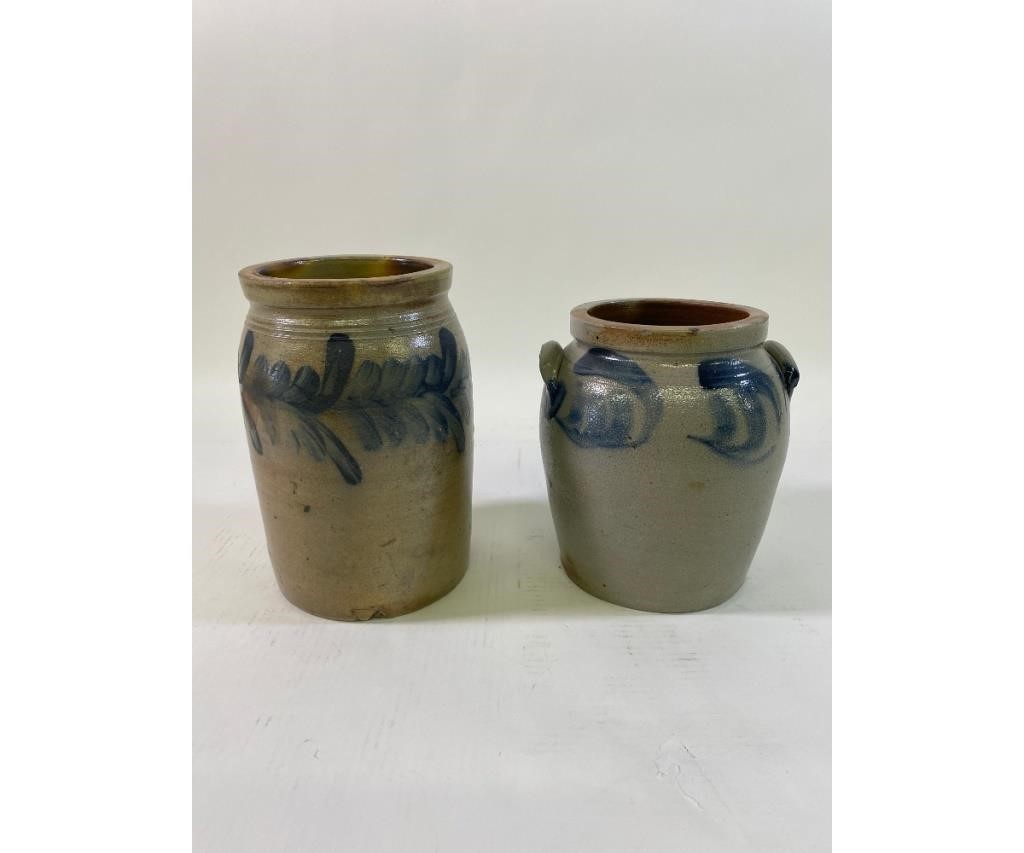 Two stoneware crocks with blue