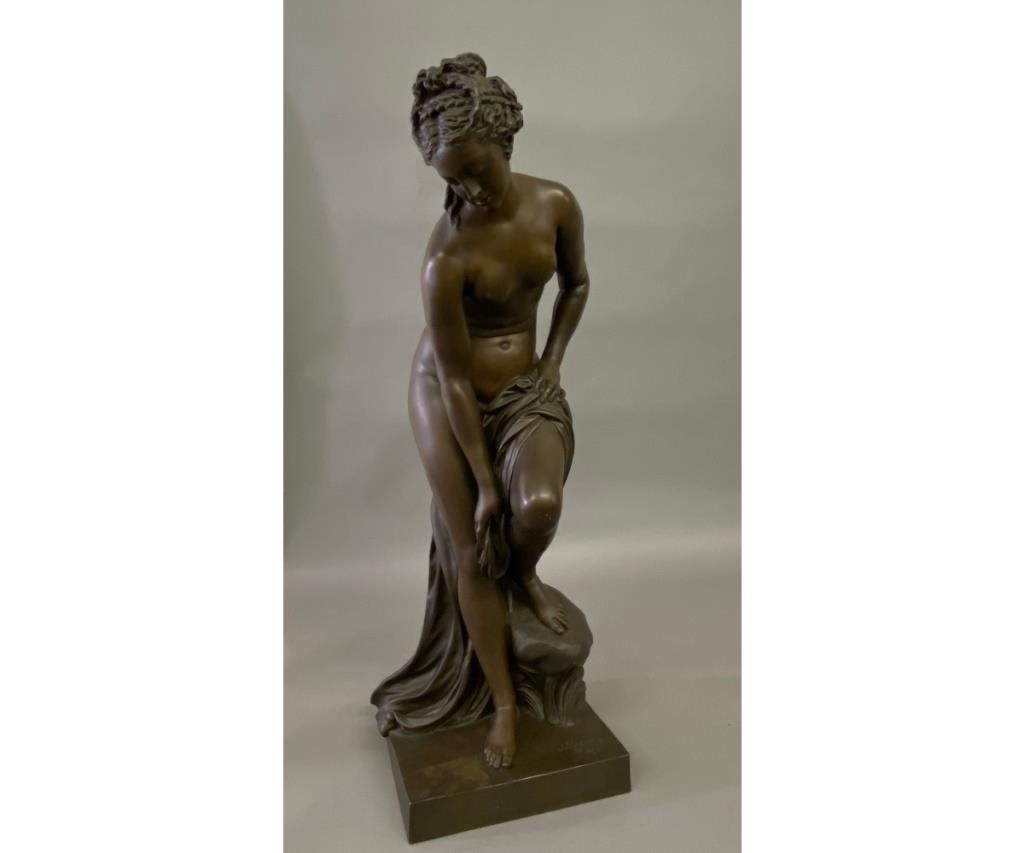 Large bronze statue titled 'Venus