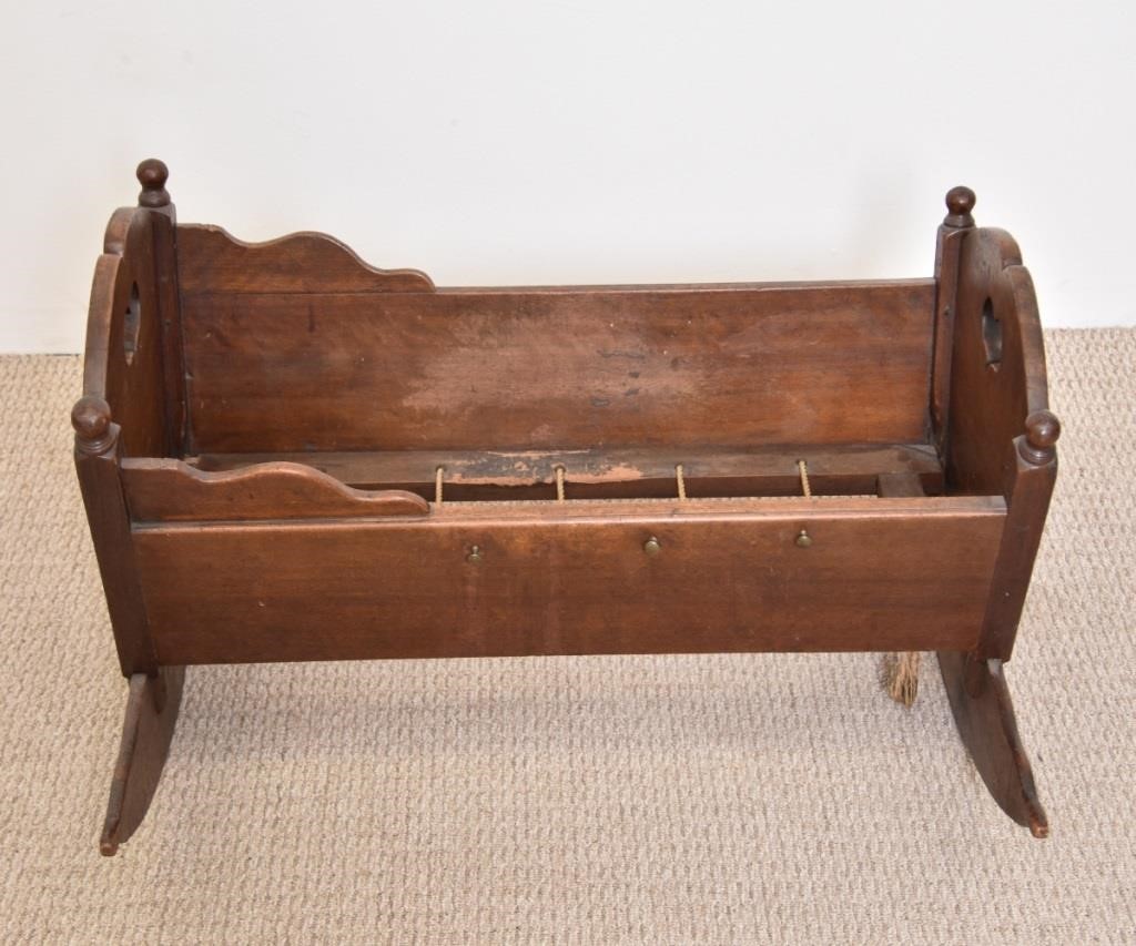 Walnut cradle, 18th c. with cut