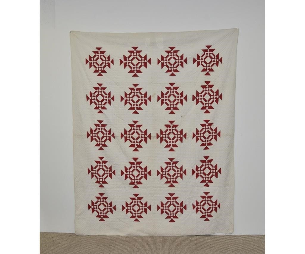 Red and white appliqué quilt.
92"