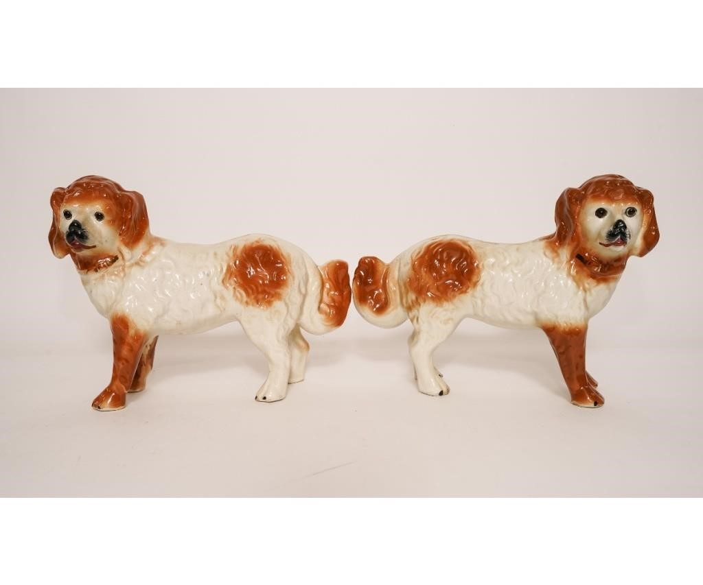 Pair of staffordshire dogs with glass