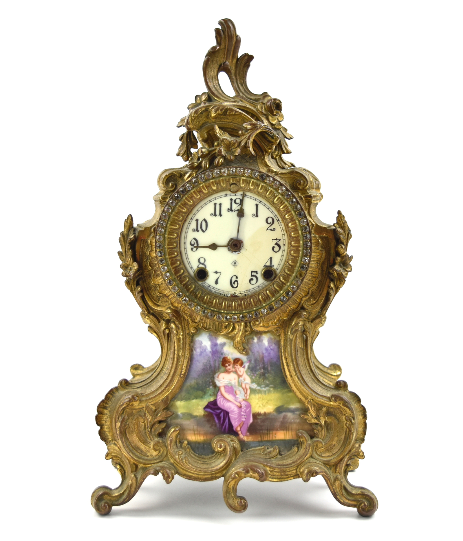 A GILT BRONZE CLOCK, 19-20TH C.