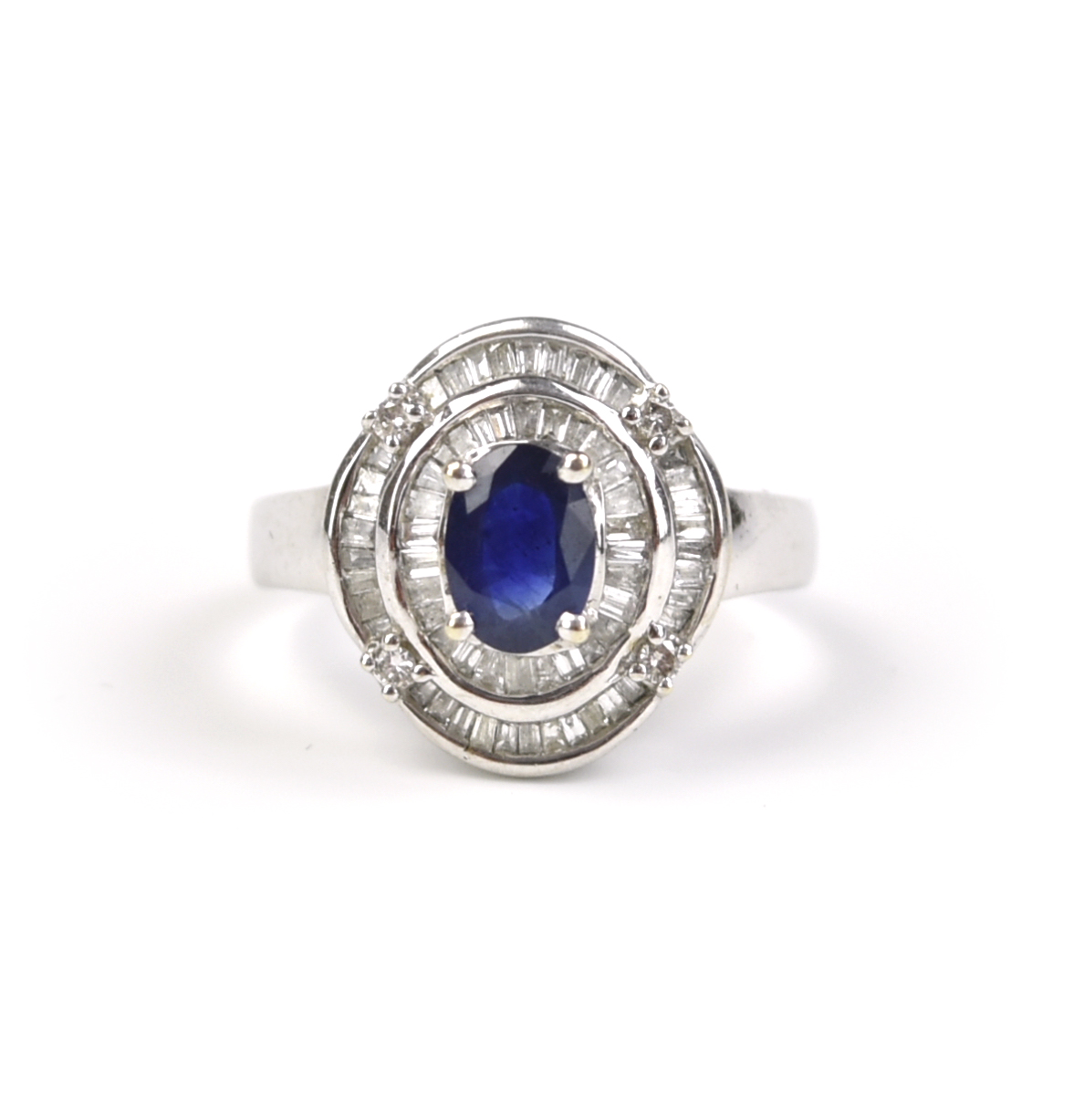 A BLUE SAPPHIRE RING WITH DIAMONDS