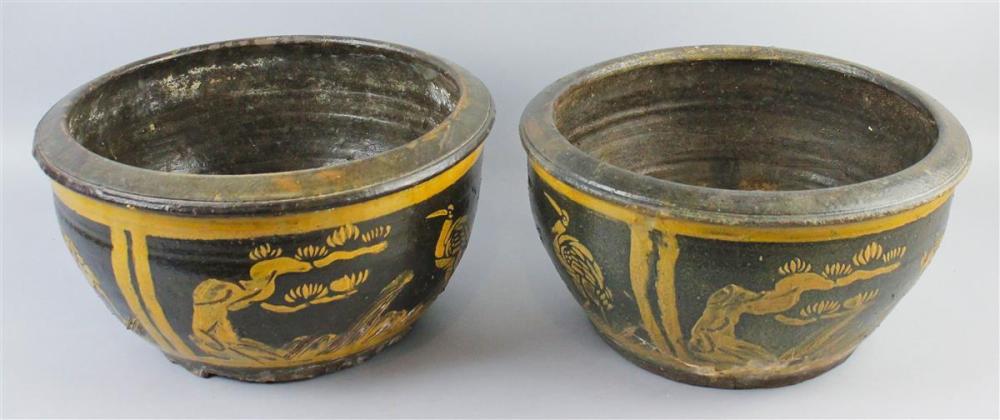 TWO BROWN AND YELLOW ASIAN STONEWARE
