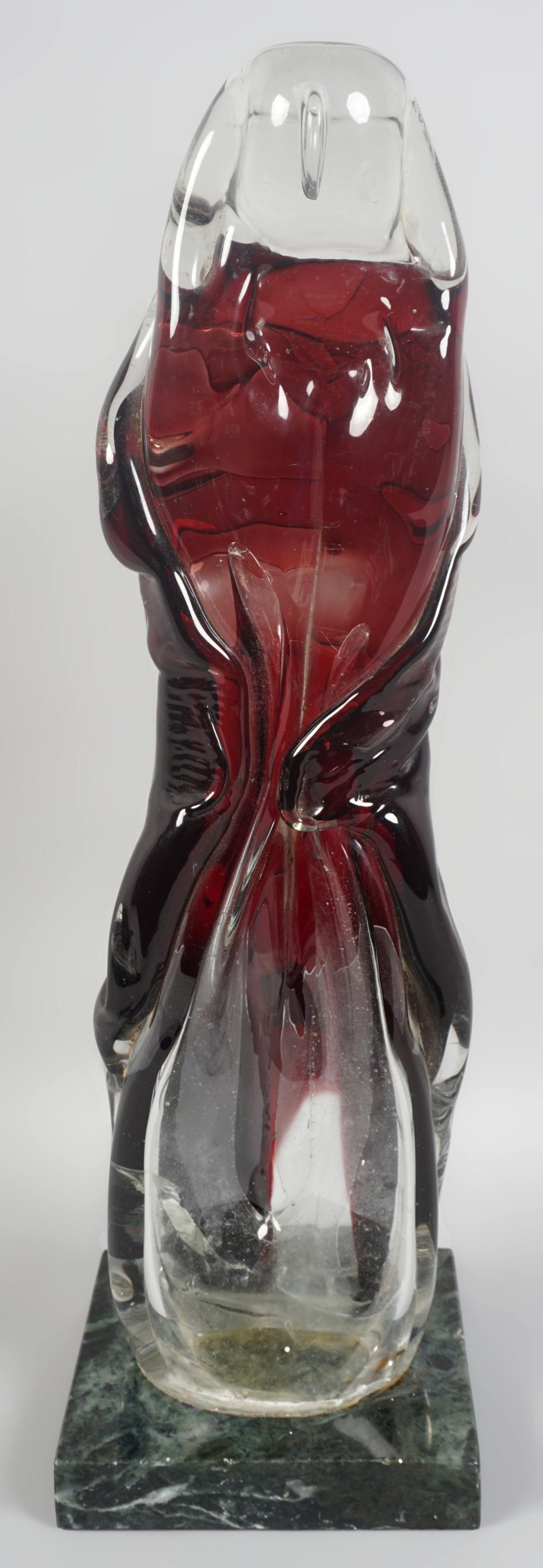 RED AND CLEAR GLASS STYLIZED FIGURE
