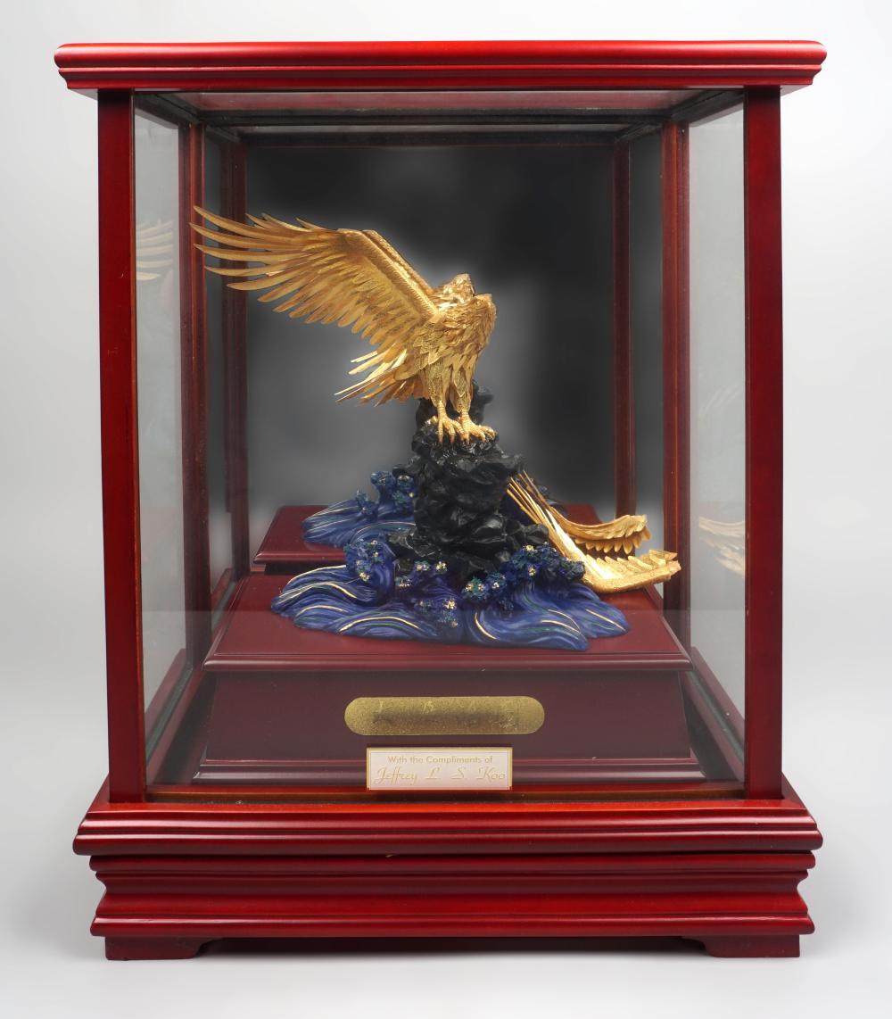 GILT METAL MODEL OF AN EAGLE PERCHED