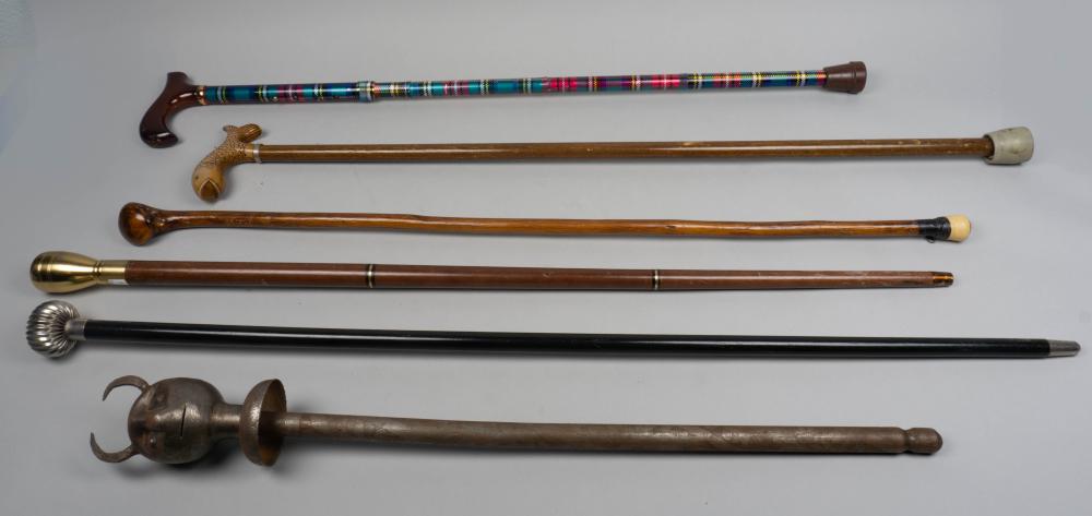 GROUP OF SIX WALKING STICKS AND