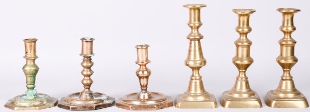 TWO PAIRS OF DUTCH BRASS CANDLESTICKS