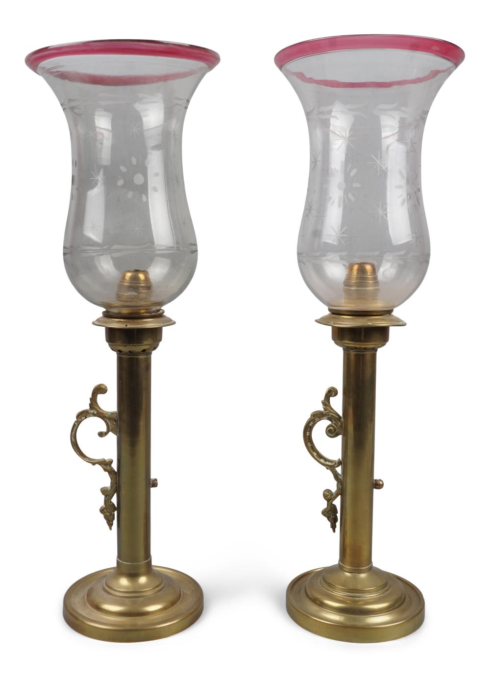 PAIR OF BRASS LAMPS WITH CRANBERRY