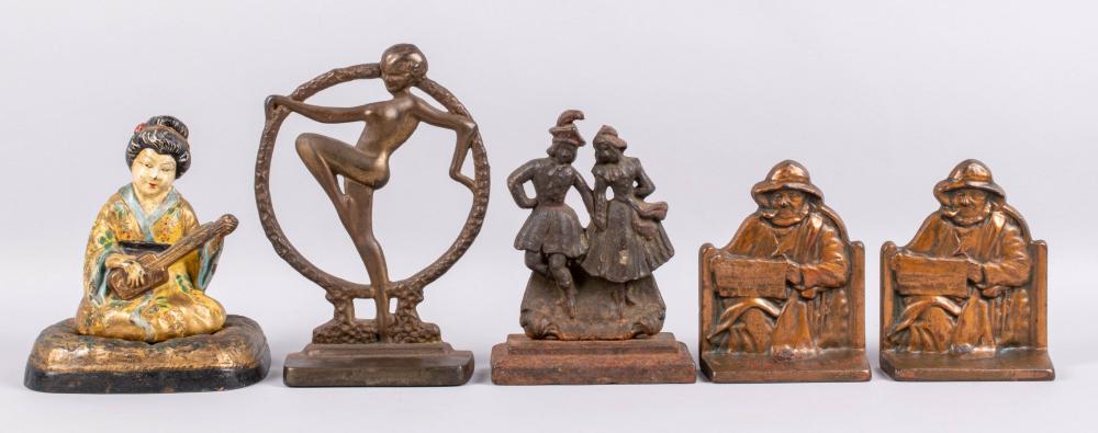 GROUP OF CAST IRON DOORSTOPS OF