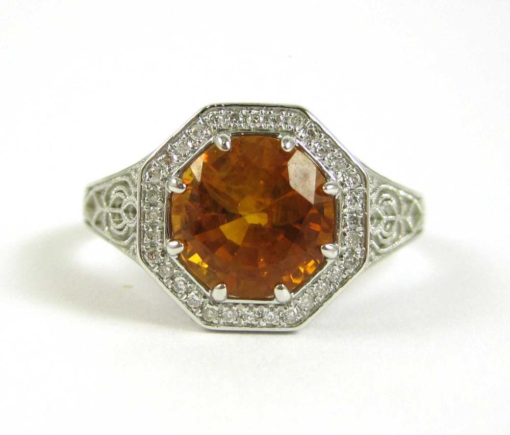 ORANGE SAPPHIRE, DIAMOND AND FOURTEEN