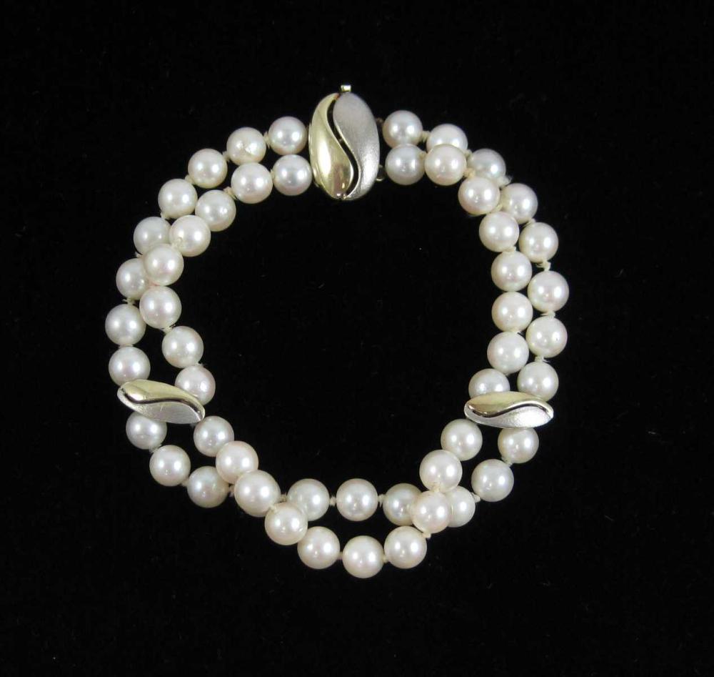 DOUBLE STRAND PEARL AND FOURTEEN 33df73