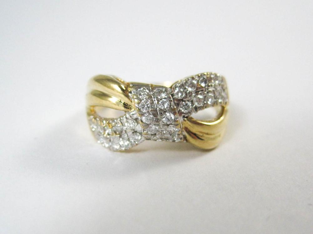 DIAMOND AND EIGHTEEN KARAT GOLD 33df7b