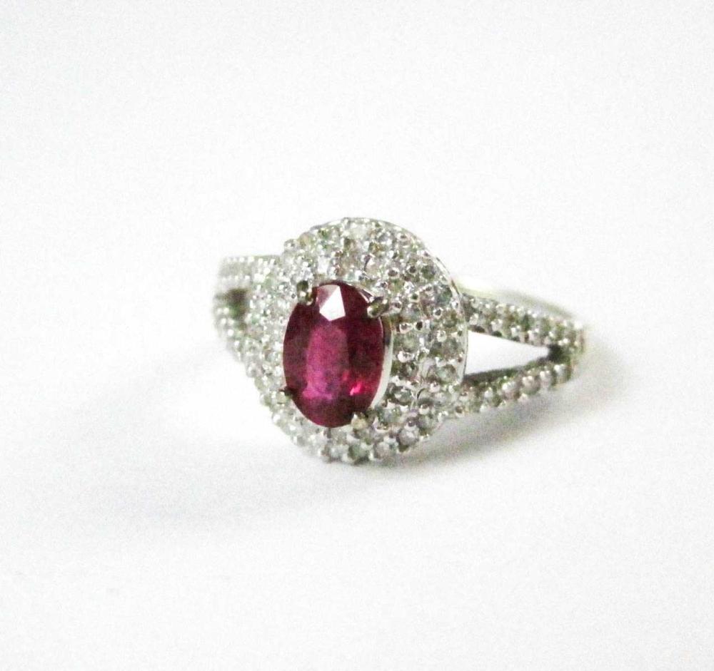 LAB CREATED RUBY AND DIAMOND RING.