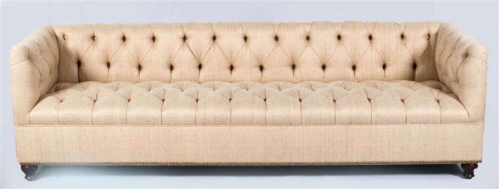 CONTEMPORARY BRASS TACKED UPHOLSTERED