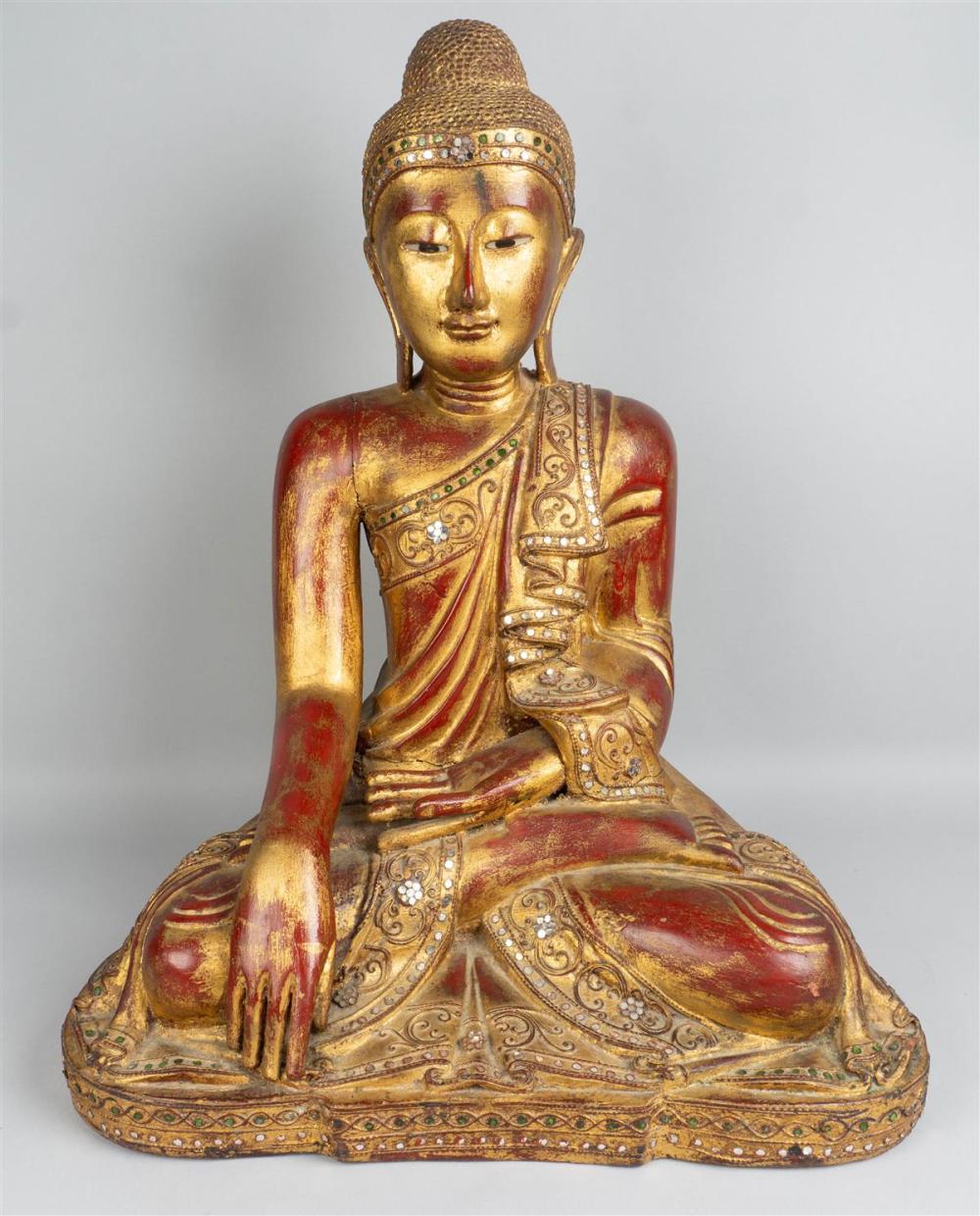 THAI RED AND GILT LACQUER FIGURE