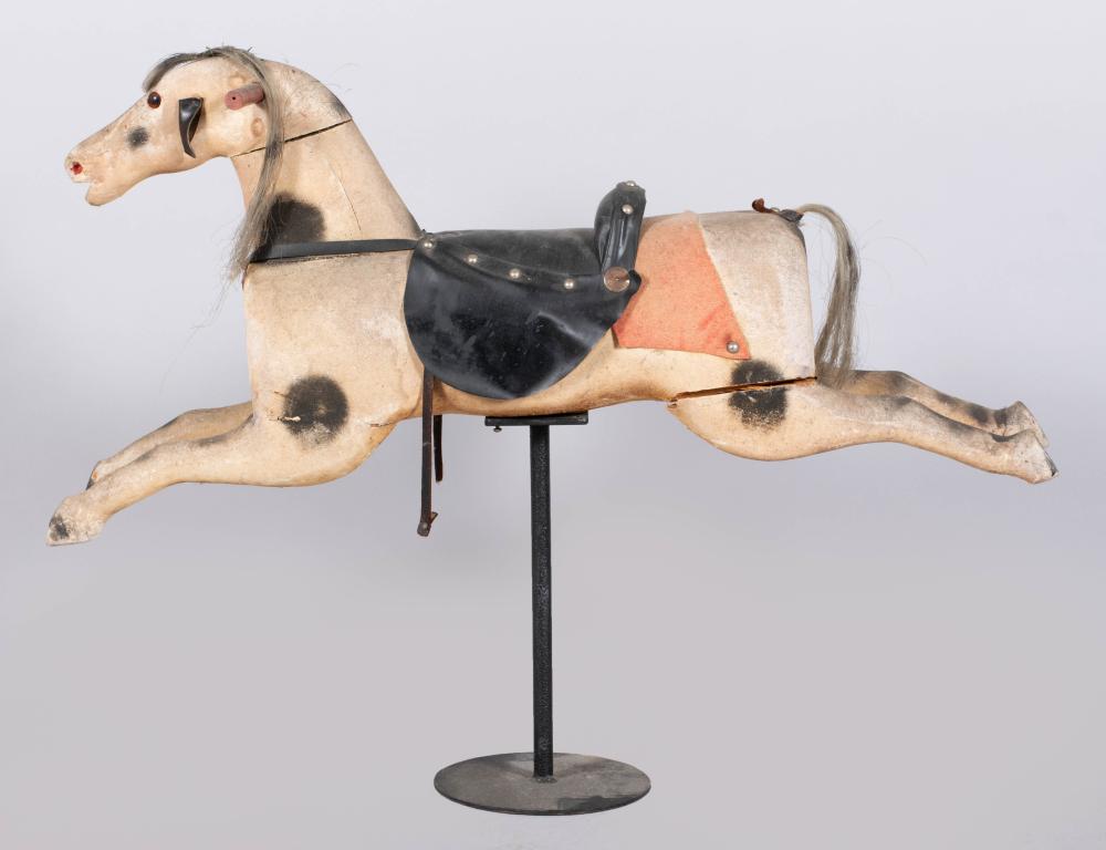 WOOD ROCKING HORSE MOUNTED ON A STAND