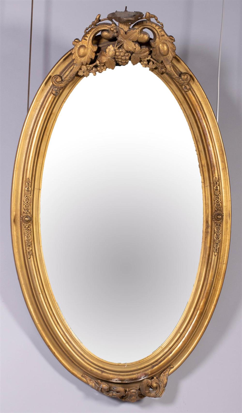 VICTORIAN GILTWOOD AND CAST METAL MIRROR,