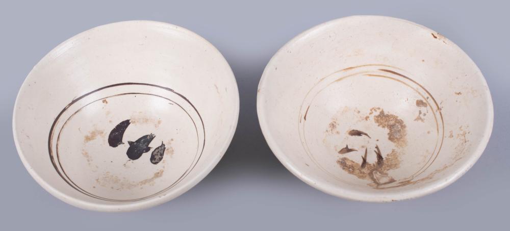 TWO CHINESE CREAM AND BROWN-GLAZED