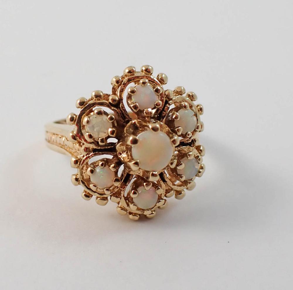 OPAL AND YELLOW GOLD CLUSTER RING.