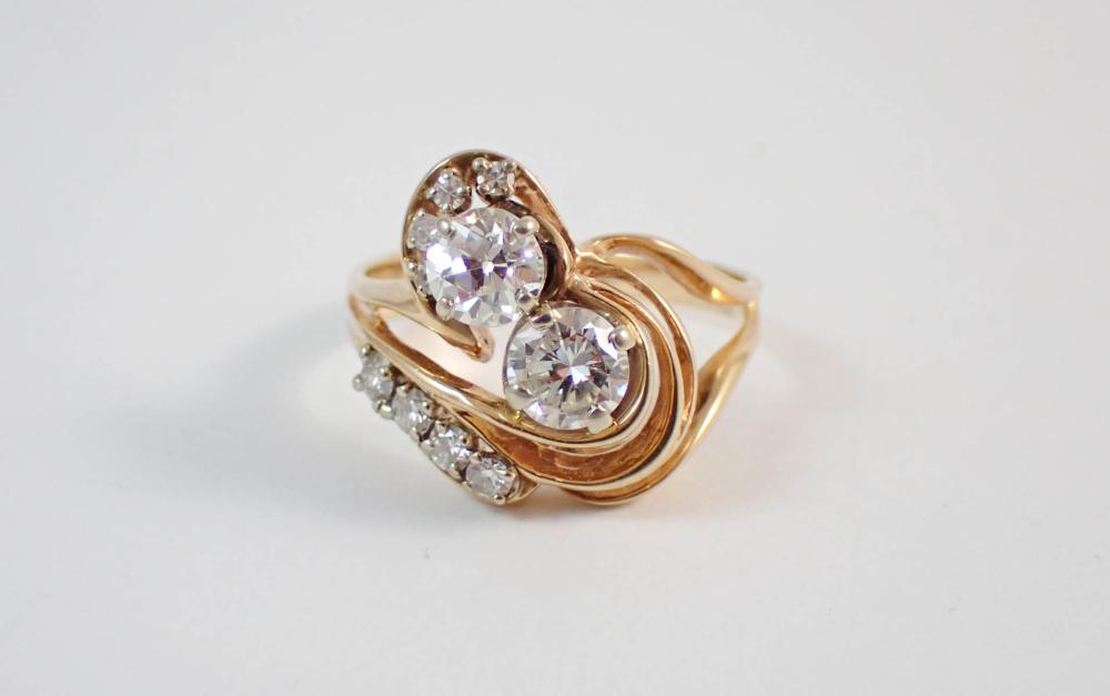 DIAMOND AND FOURTEEN KARAT GOLD 33f2b4