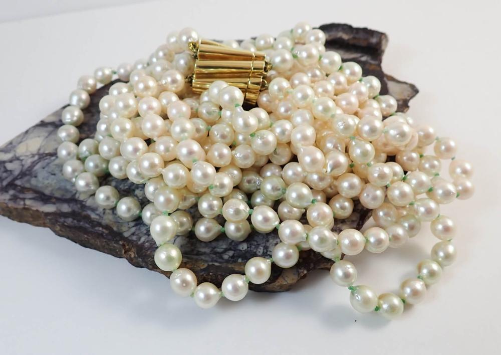 MULTI-STRAND PEARL AND EIGHTEEN