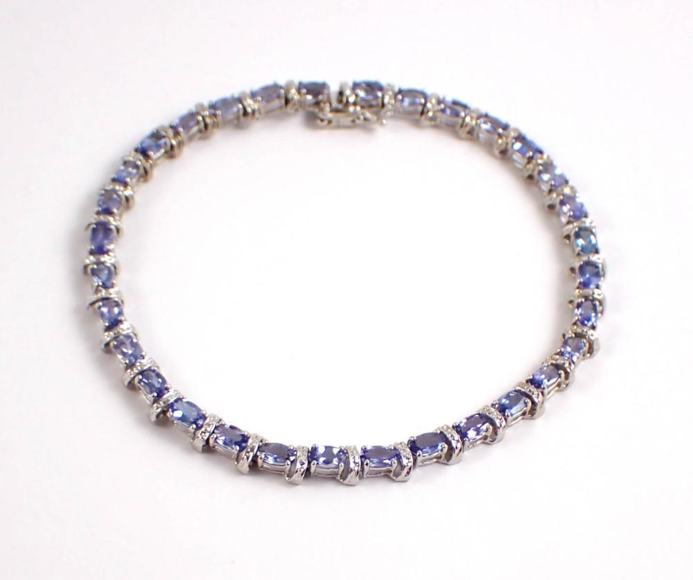 TANZANITE, DIAMOND AND FOURTEEN