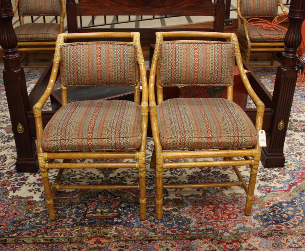 A SET OF FOUR MCGUIRE RATTAN ARMCHAIRS,